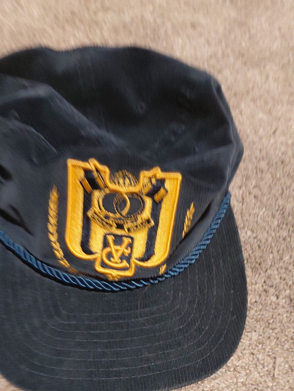 Navy Cap with Gold Embroidered Crest